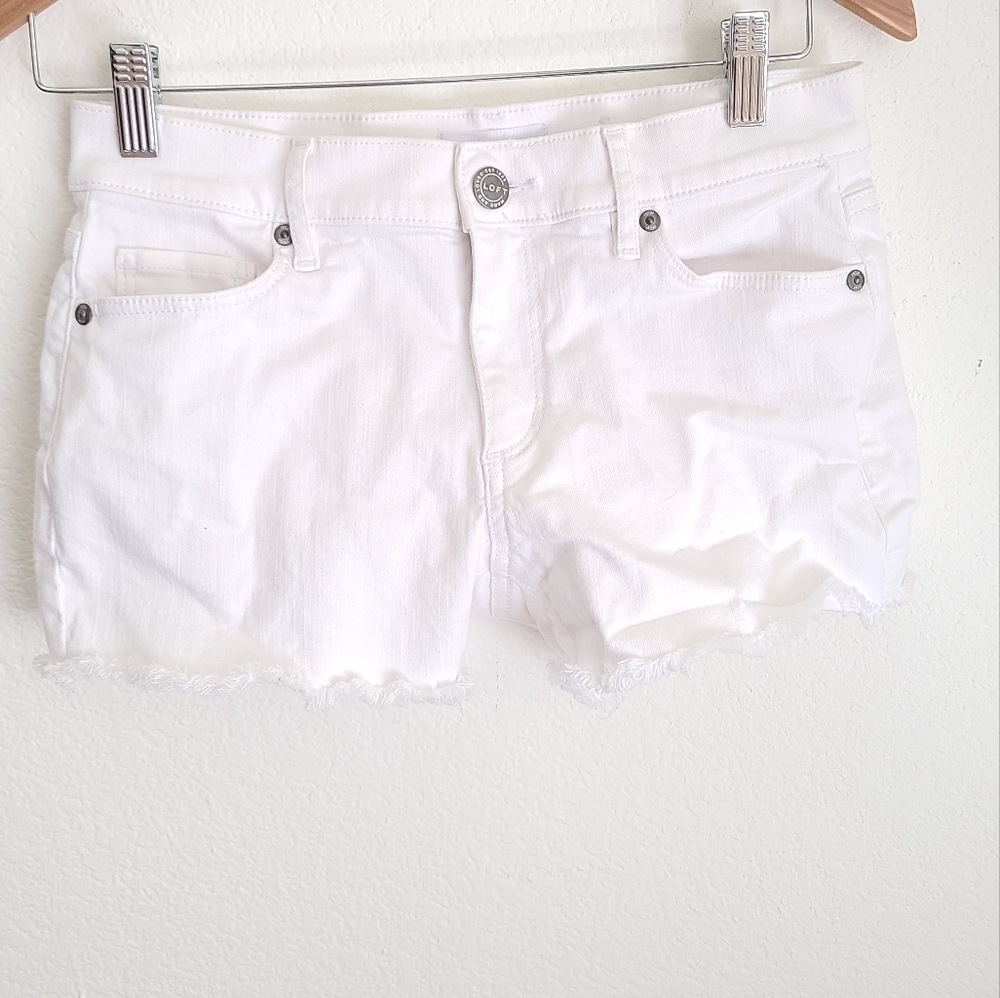 Loft white jean cutoff shorts size 00 cotton blend.